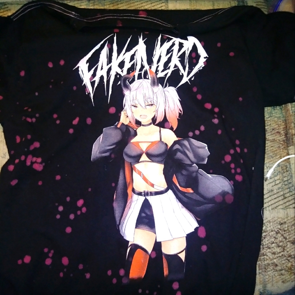 Unisex graphic tee. Size M. Fake is the brand. Black